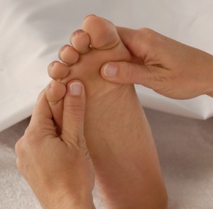 heal sore feet with massage