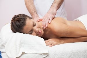 Woman Receiving A Massage At The Spa